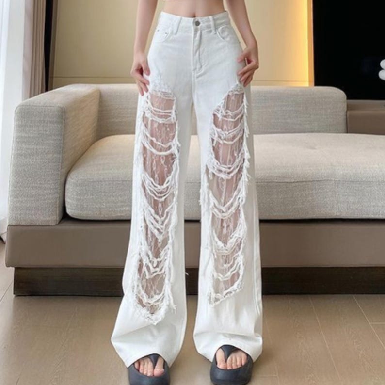 Women’s Ripped Denim Pants | Lace Straight Leg Trousers | Streetwear Style Outfit | Y2K Trend

Women’s ripped denim pants with loose-fit silhouette and straight-leg design suitable for streetwear outfits and everyday styling.