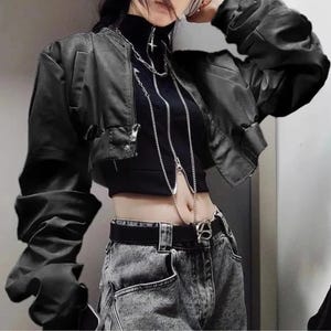 Women's Casual Retro Jacket | Long Sleeve Punk Alternative Coat | Gothic Vintage Y2k Fashion
.
Cropped gothic streetwear jacket for women with long sleeves and edgy punk Y2K fashion design, perfect for alternative outfits.