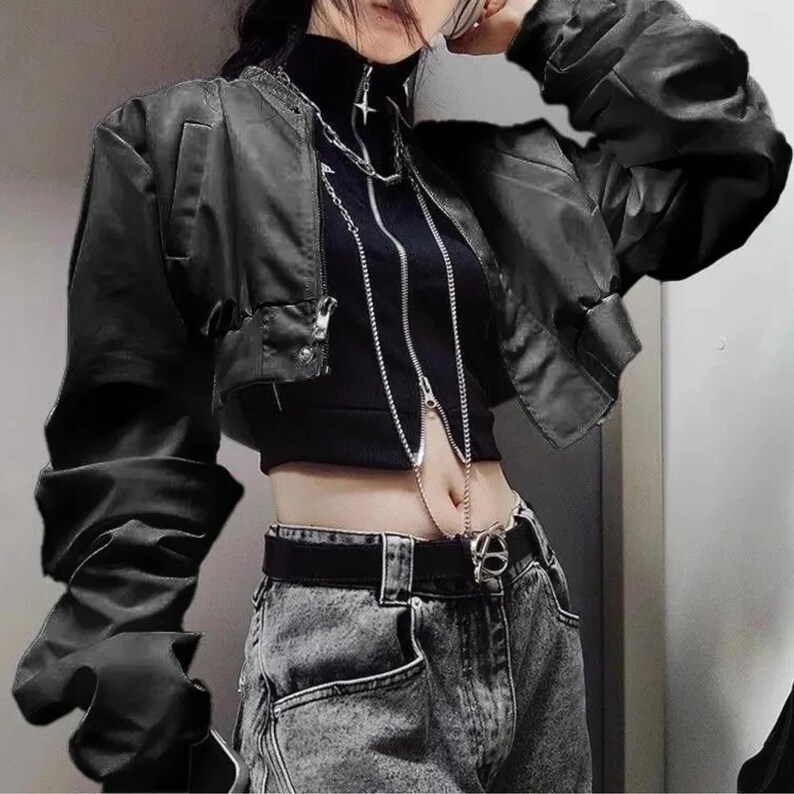 Women's Casual Retro Jacket | Long Sleeve Punk Alternative Coat | Gothic Vintage Y2k Fashion
.
Cropped gothic streetwear jacket for women with long sleeves and edgy punk Y2K fashion design, perfect for alternative outfits.