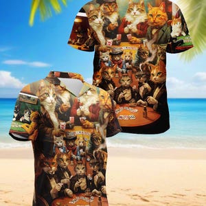 May include: A short-sleeved button-down shirt featuring a whimsical design of cats playing poker. The cats are depicted in various outfits, gathered around a poker table with cards and chips. The background shows a beach scene with palm trees and ocean.