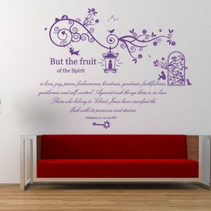 May include: Purple wall decal featuring a floral design and a quote from Galatians 5:22-24 NTV: "But the fruit of the Spirit is love, joy, peace, forbearance, kindness, goodness, faithfulness, gentleness and self-control. Against such things there is no law. Those who belong to Christ Jesus have crucified the flesh with its passions and desires."