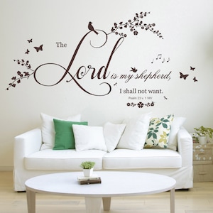 May include: A white wall with a brown vinyl decal featuring a floral vine with a bird, butterflies, and musical notes. The decal includes the text "The Lord is my shepherd, I shall not want. Psalm 23 v. 1 NIV".