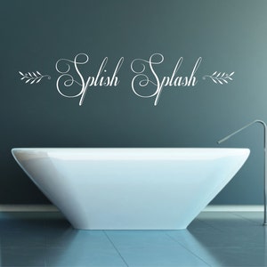 May include: White bathtub with a white vinyl decal that says "Splish Splash" with a leafy design on either side of the text.