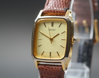 Seiko 1f21-5a70 gold tank ladies watch new battery vintage 1991 near mint japan