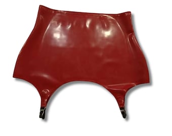 May include: A shiny, red garter belt with two straps and black metal clasps. The garter belt is made of a smooth, glossy material and has a curved shape.