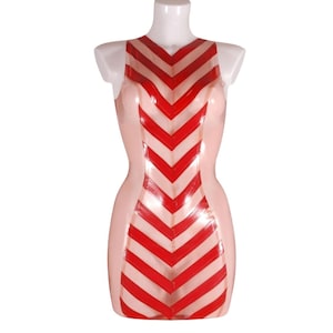 May include: A sleeveless latex dress with a chevron pattern in red and pink.