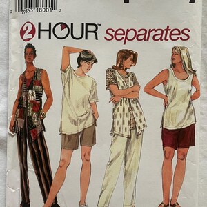 May include: Simplicity sewing pattern number 9546 for separates. The pattern is for sizes 18W-24W. The pattern shows four different outfits, including a vest, a t-shirt, a tank top, and a pair of shorts.