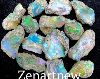 May include: A collection of rough opal stones with vibrant flashes of color, including blues, greens, and pinks. The opals are set against a dark background, with the text "Zenartnew" in white.
