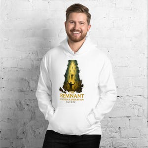 May include: White hooded sweatshirt with a front graphic. The graphic features a silhouette of people reaching upwards towards a bright light, with the text "THE REMNANT CHOSEN GENERATION Joel 2:32".