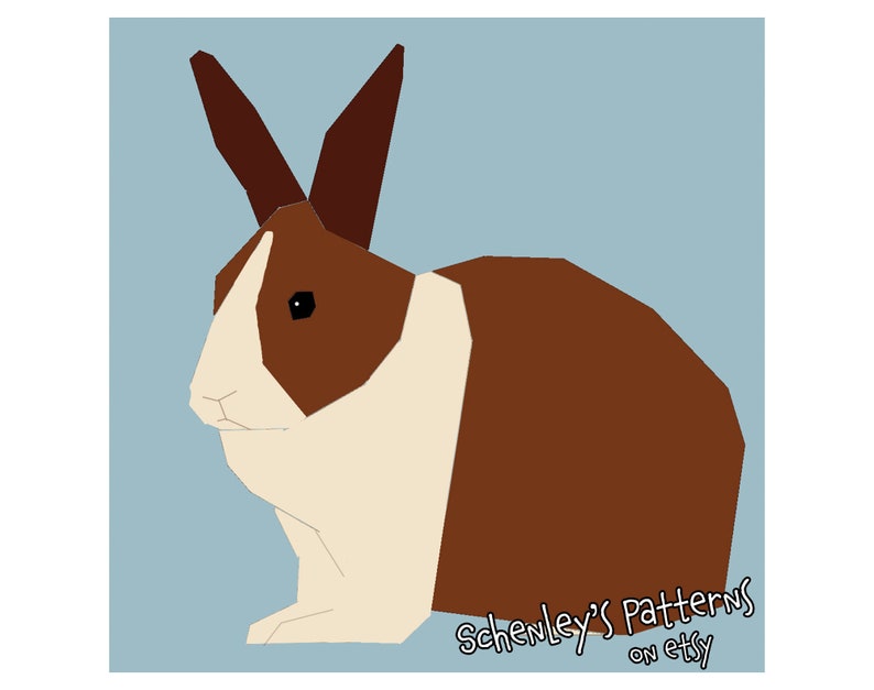 An illustration of this quilt pattern.  A rabbit is seen from the side.  It has dutch coloring, brown fur with a white band across its chest and a white stripe on its head.