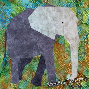 A photo of a quilt block made from this pattern.  An African elephant walks