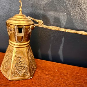 Brass Middle Eastern Coffee pot with intricate engraving