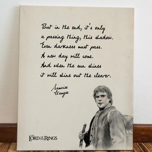 May include: Canvas art print featuring a quote from The Lord of the Rings, with a portrait of Samwise Gamgee. The quote reads, "But in the end, it's only a passing thing, this shadow. Even darkness must pass." The Lord of the Rings logo is at the bottom.