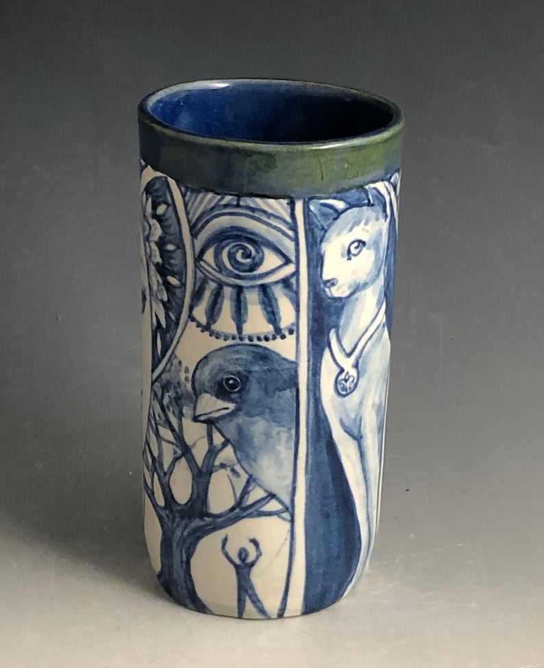 cat and more Blue and white vase with faces
