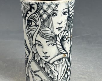 Handmade Porcelain Story Cup: Black and White Faces, Gold Interior