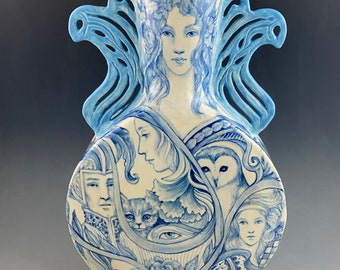 14.5 inch tall large art vase in blue and white with faces,animals and much more one of a kind hand formed and painted winged vase