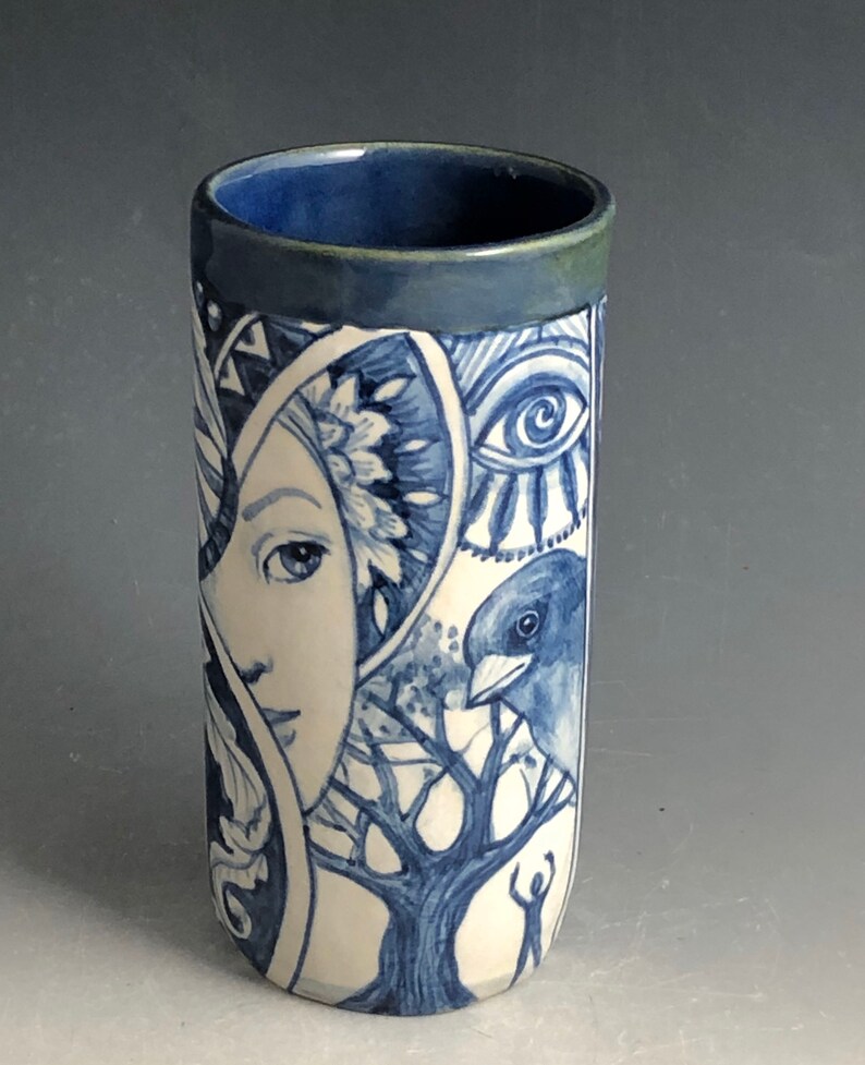 cat and more Blue and white vase with faces