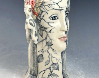 Double face vase sculpture 6.7 inches tall OOAK,with carved wings, sculpted by hand