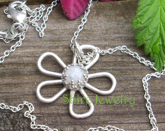 Sterling Flower with Moonstone in Crown Bezel