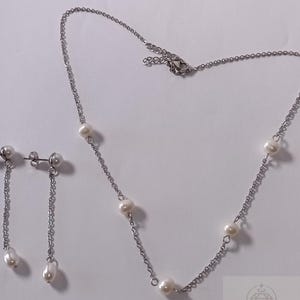 Elegant set in steel and freshwater cultured pearls