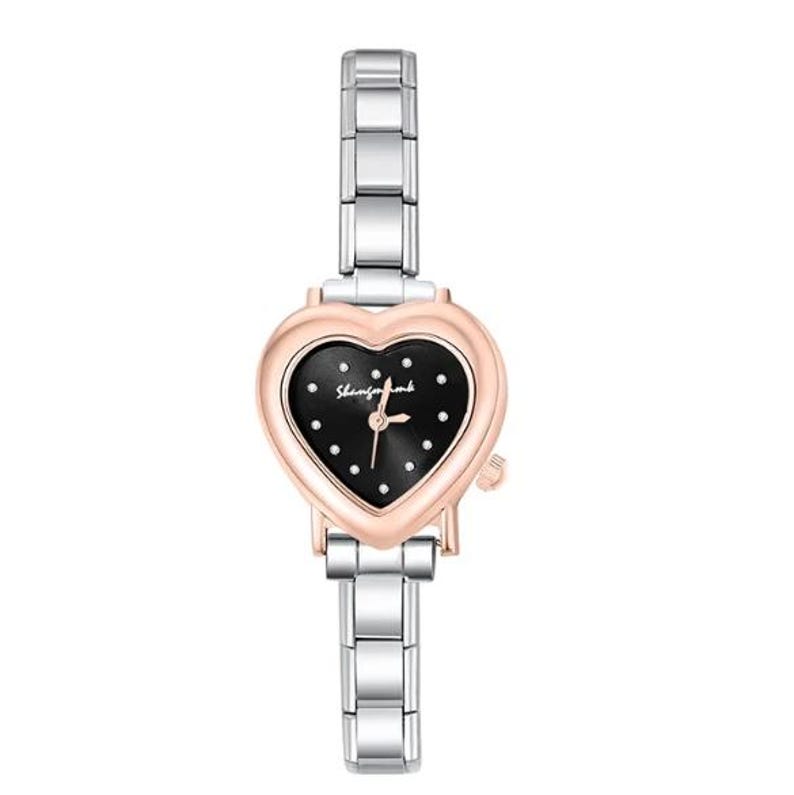 May include: A silver and rose gold wristwatch with a heart-shaped face. The watch face is black with small white dots and silver hands. The watch band is silver and made of rectangular links. The watch has the text "Shenfengbank" on the watch face.