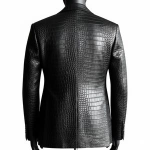 May include: Black blazer with a crocodile-effect texture. The jacket features a classic two-button closure and notched lapels. The blazer is displayed on a mannequin against a white backdrop.