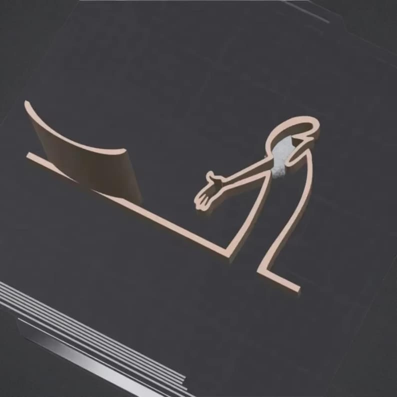 May include: A minimalist, abstract sculpture in a warm, copper-like tone. The design features a stylized human figure with an outstretched arm, a curved element, and a silver accent. The artwork is set against a dark background.