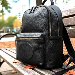 Black Pebbled Leather Slim Backpack | Scratch-Resistant, Logo Embossed