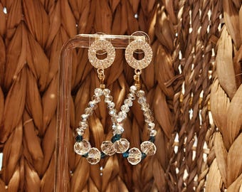 Crystals in hoop earring form with blue highlights