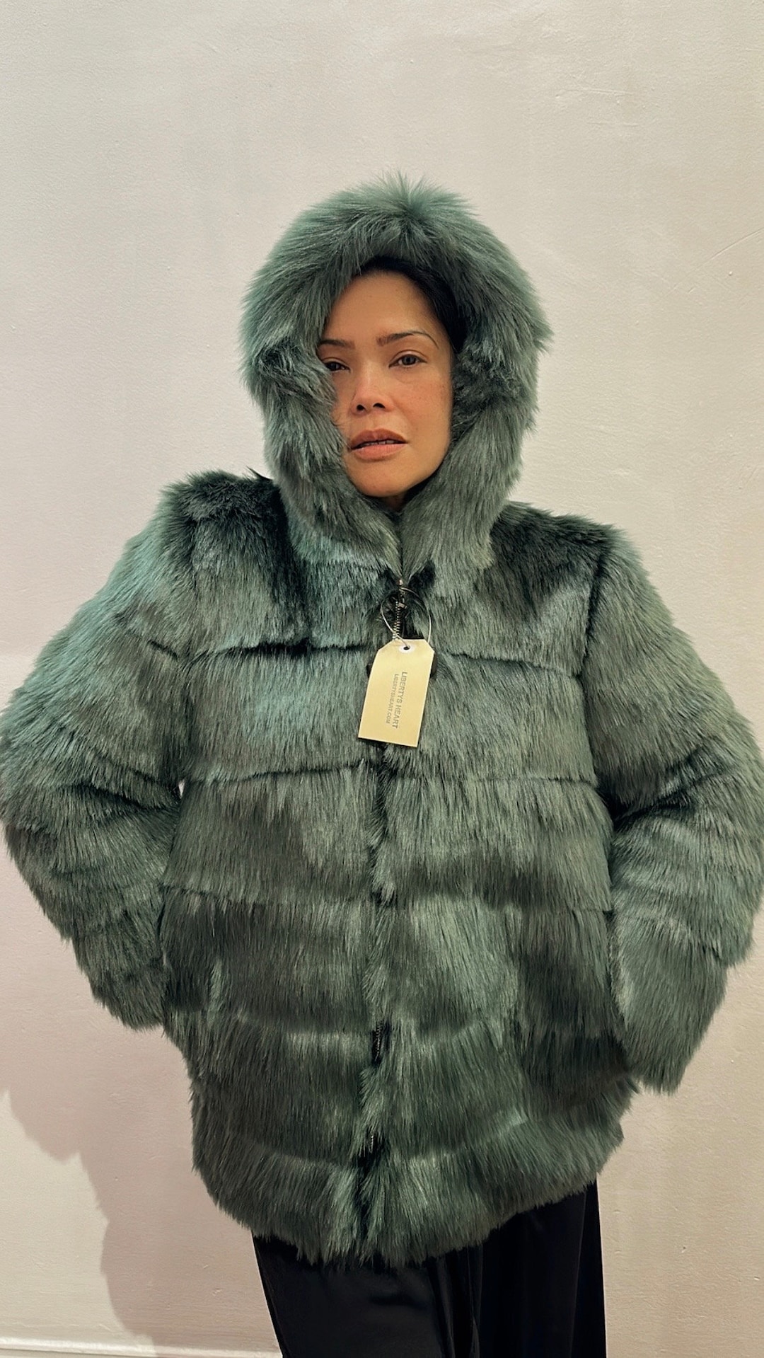 Cappotto con cappuccio in pelliccia sintetica verde Italia