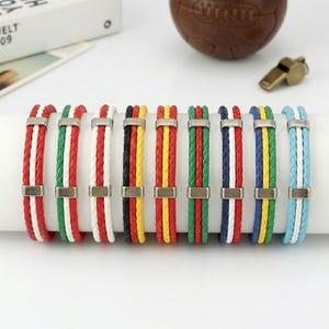Armband i VM-flaggfärg, vävt PU-läderarmband för fläktar, unisex