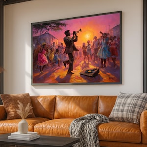 May include: A framed painting depicts a jazz musician playing a trumpet at a street party. The artwork features a vibrant sunset, a crowd of people dancing, and a vintage record player. The color palette includes warm tones of orange, pink, and brown.