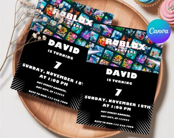 May include: Two black and white birthday invitations with the text "ROBLOX PLAYERS" and "DAVID IS TURNING 7". The invitations are on a wooden tray with cupcakes in the background. The invitations include the date, time, address, and RSVP information.