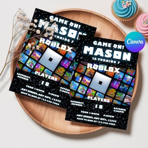 May include: Two black invitations with the text "GAME ON! MASON IS TURNING 7" and "ROBLOX" logos. The invitations have a starry background and include event details. The invitations are on a wooden tray.