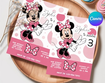 May include: Two pink birthday invitations featuring Minnie Mouse in a polka dot dress and bow. The invitations include the name "Sophia" and the number "3". The invitations are on a wooden tray with cupcakes in the background.