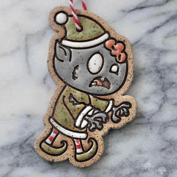 Zombie elf Christmas ornament, ceramic Santa’s helper