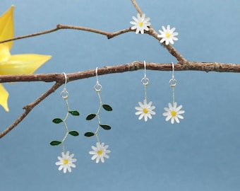 Handmade daisy dangle and stud earrings, in resin and wire