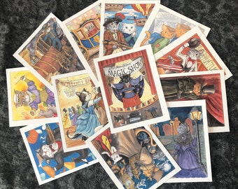 May include: A set of 10 colorful illustrated cards featuring cats in various scenes. The cards feature a variety of themes, including magic, a tea party, and a circus. The cards are perfect for adding a touch of whimsy to any home decor.