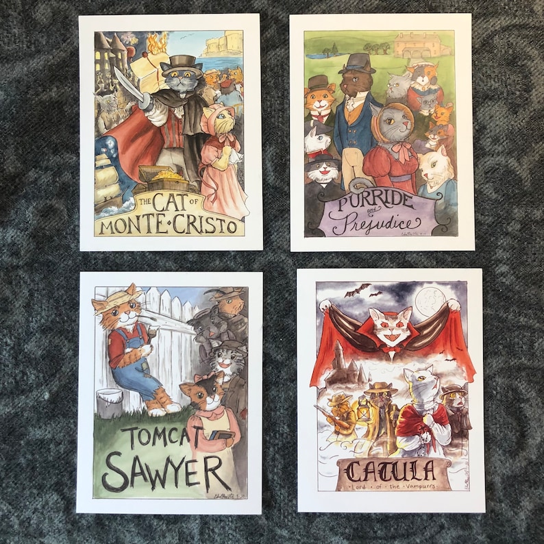 May include: Four illustrated cards featuring cats in various literary-themed scenes. The first card depicts a cat dressed as Edmond Dantes from "The Count of Monte Cristo" with the title "The Cat of Monte Cristo". The second card shows a group of cats dressed in 19th-century attire with the title "Purride and Prejudice". The third card features a cat dressed as Tom Sawyer with the title "Tomcat Sawyer". The fourth card shows a cat dressed as Dracula with the title "Catula, Lord of the Vampires".