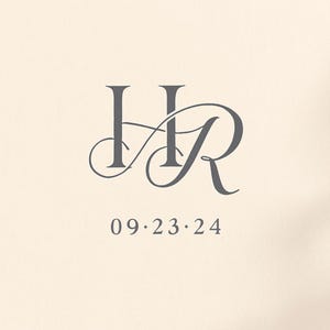 May include: A gray monogram featuring the letters "HR" intertwined with elegant flourishes. Below the monogram, the date "09.23.24" is displayed in a simple, clean font, set against a cream-colored background. Ideal for wedding invitations.