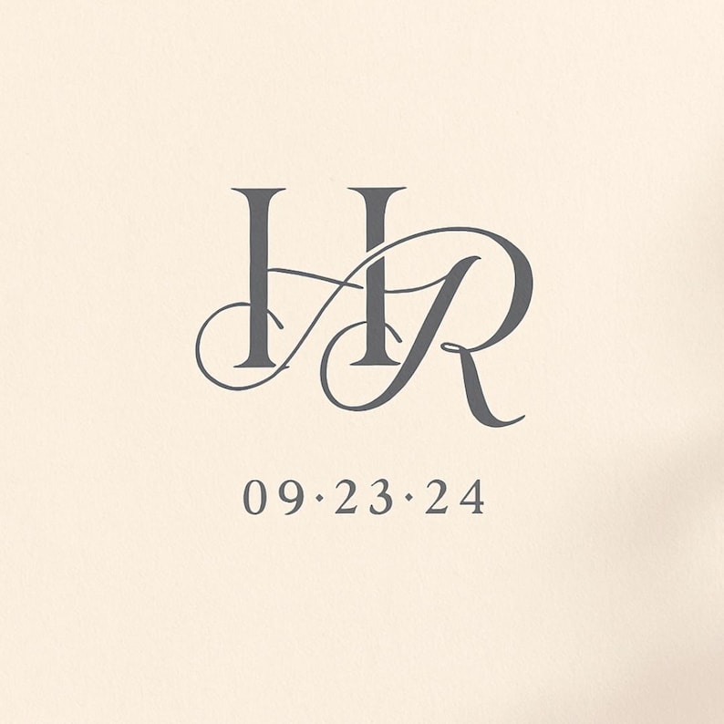 May include: A gray monogram featuring the letters "HR" intertwined with elegant flourishes. Below the monogram, the date "09.23.24" is displayed in a simple, clean font, set against a cream-colored background. Ideal for wedding invitations.
