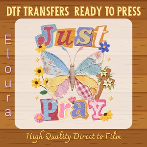 May include: A DTF transfer design with a patchwork butterfly and the words "Just Pray." The design incorporates flowers and a cross, with the text "High Quality Direct to Film."