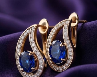 Elegantes pendientes ovalados de zafiro cultivado en laboratorio en plata bañada en oro de 14 quilates. Regalo ideal para bodas.