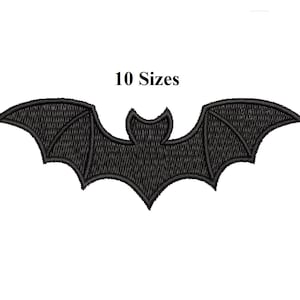 May include: Black embroidered bat patch with outstretched wings. The patch has a detailed, textured design and the text "10 Sizes" above the bat. Perfect for Halloween or gothic-themed crafts.