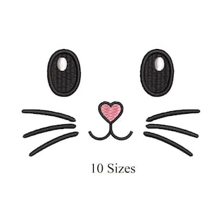 Peut inclure: Motif brodé d'un visage de lapin avec des yeux noirs ovales, des moustaches et un nez rose en forme de cœur. Le texte "10 Tailles" est en dessous, indiquant les tailles disponibles pour le motif de broderie.