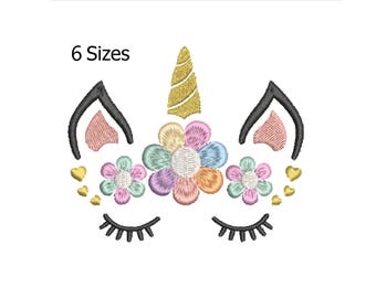 May include: An embroidered unicorn face with a golden horn, black ears, and closed eyelashes. The design includes colorful flowers and small golden hearts. The text "6 Sizes" is at the top.