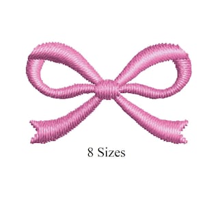 May include: A pink embroidered bow with textured detailing. The bow is centered on a white background. The text "8 Sizes" is below the bow.