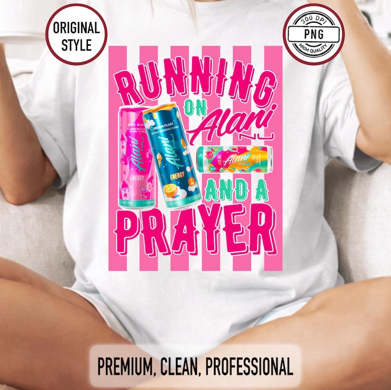 May include: White t-shirt with a pink and white striped design. The shirt features the text "RUNNING ON Alani AND A PRAYER" in pink and green. Three Alani energy drink cans are also displayed.