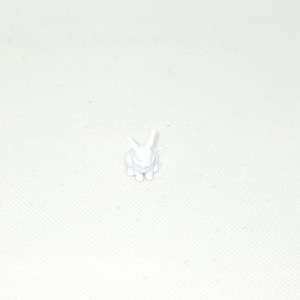 May include: A small, white bunny figurine. The rabbit is sitting upright with its ears perked up. The figurine is made of a solid, opaque material and is set against a white background.