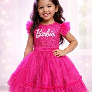 pink dress barbie theme Best pink dresses: 21 dresses we could totally see Barbie wearing